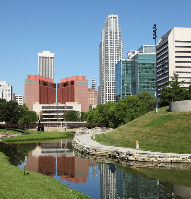 Serene park in downtown Omaha, featuring a water stream in the foreground