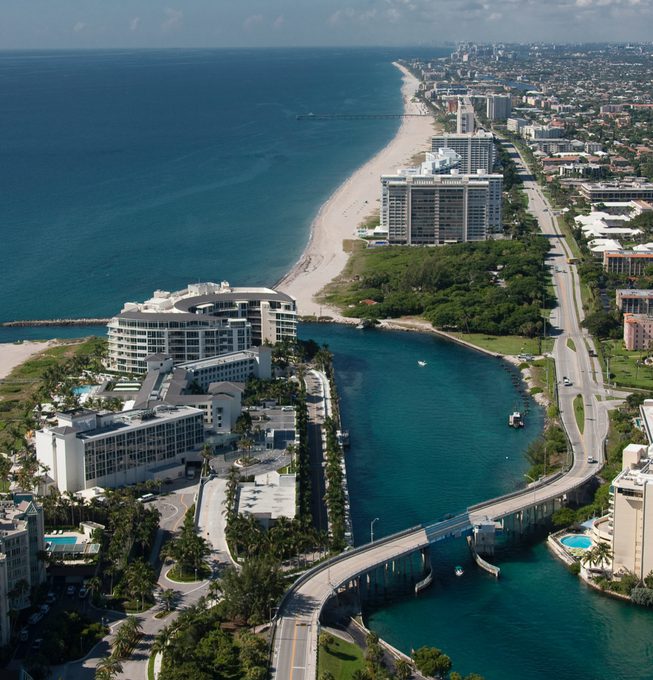 Aerial view of Boca Raton beach under bright sunlight, showcasing its coastal beauty