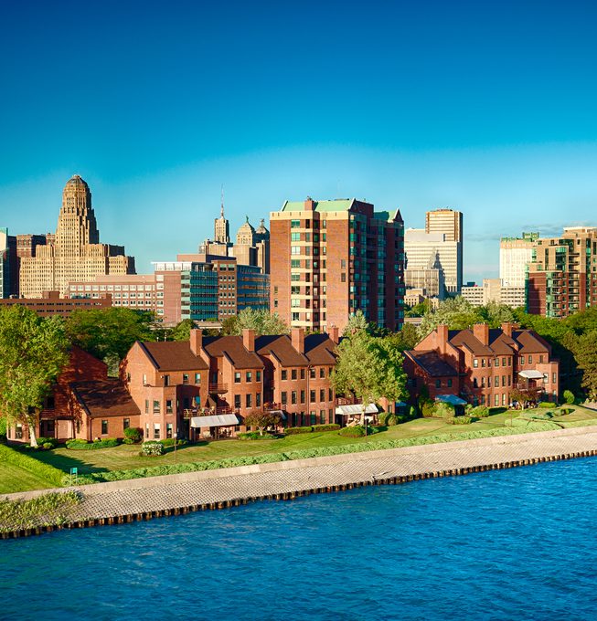 Row of historic buildings in Buffalo, NY, located by the serene lakeside